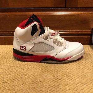 Jordan 5 retro fire red black tongue.